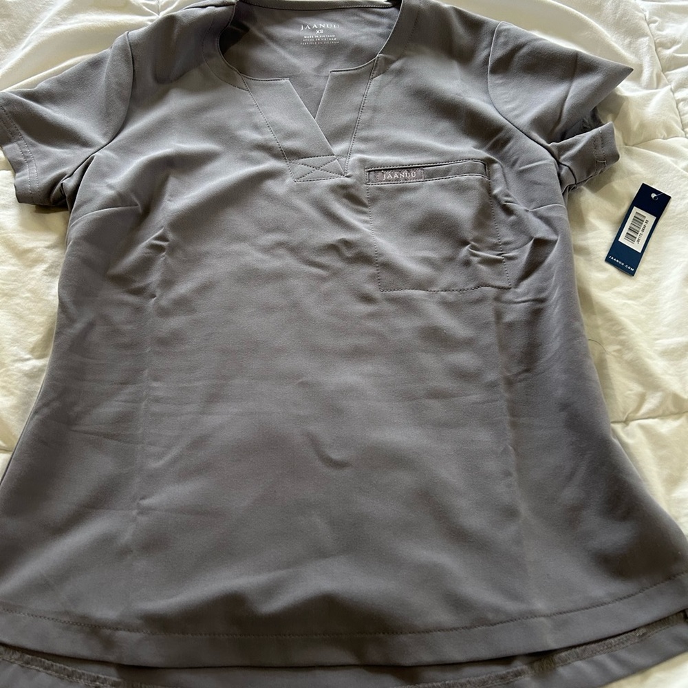 Jaanuu scrub set, xsp joggers and xs petite top.